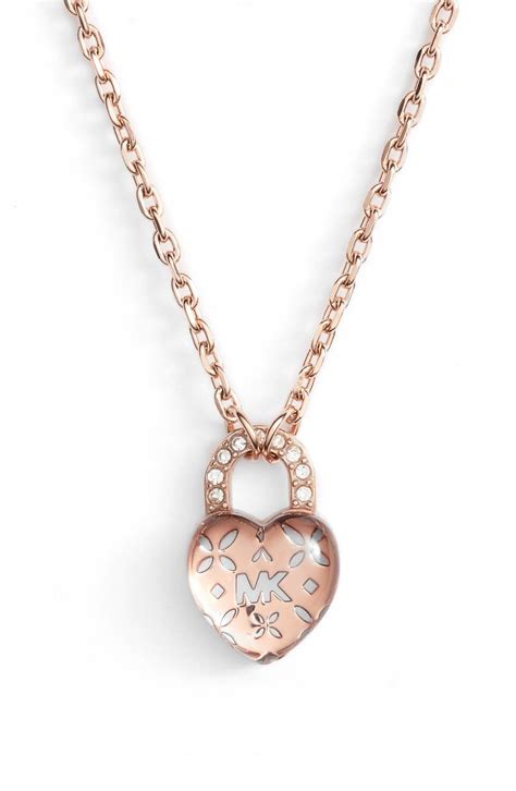 michael kors logo lock toggle necklace|Michael Kors gold heart necklace.